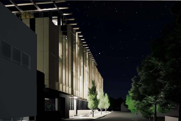 Architect's rendering of the Life and Mind Building east facing façade at night.